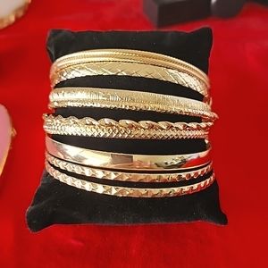 10 Goldtone Bangle Bracelets